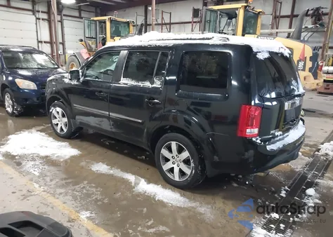 2015 Honda Pilot Touring z USA, uszkodzony, nr VIN 5FNYF4H96FB024812